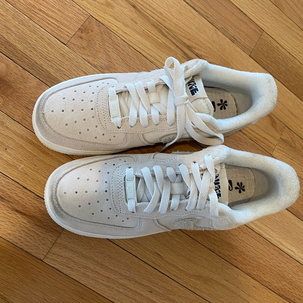 Nike Air Force ones.  Women’s size 8